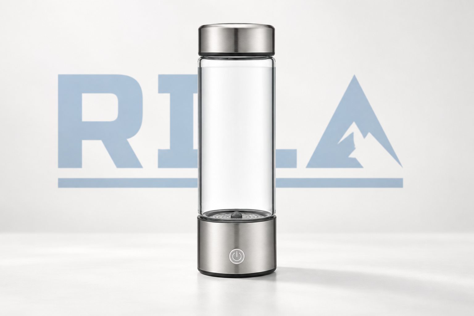 Rila Hydrogen glass bottle on a clean light background with the Rila logo